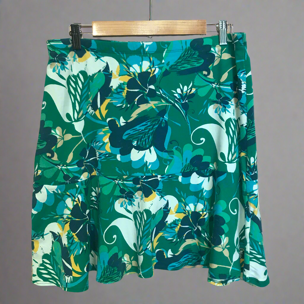 barefoot on the sand green skirt