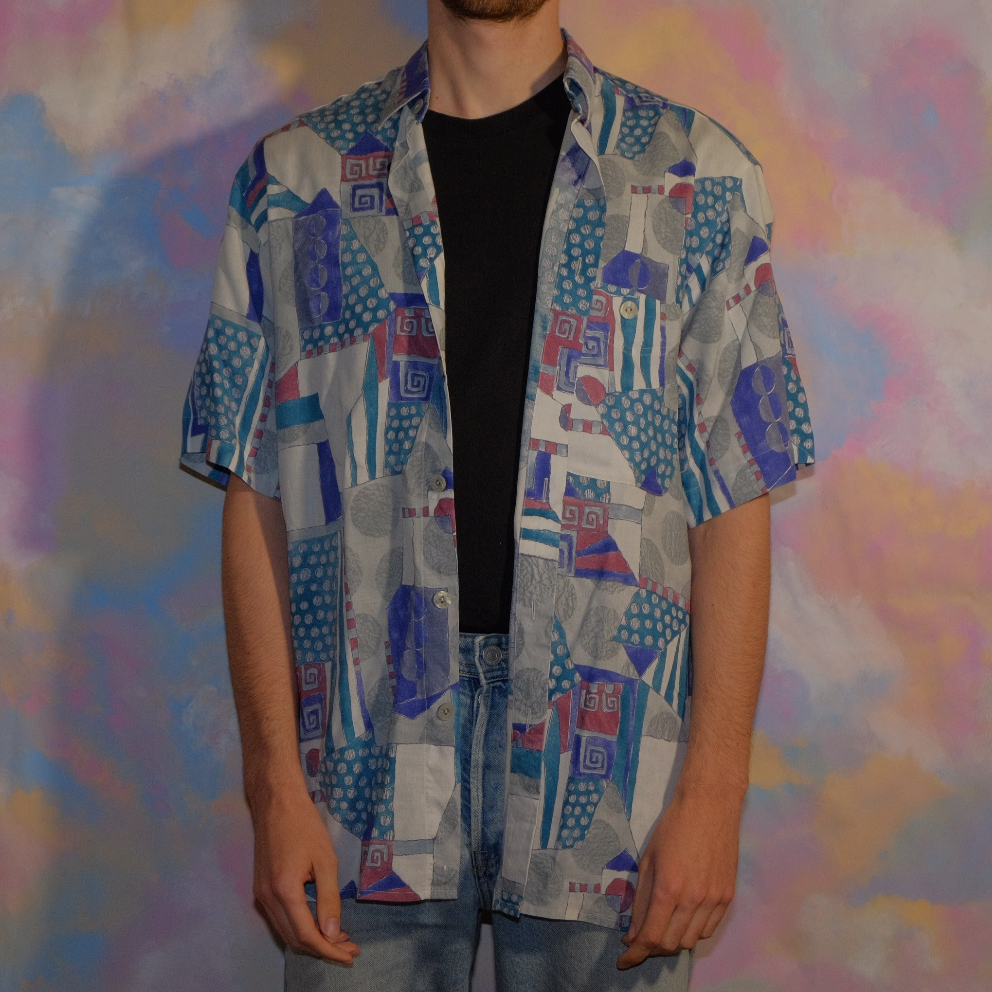 living sculpture blue shirt
