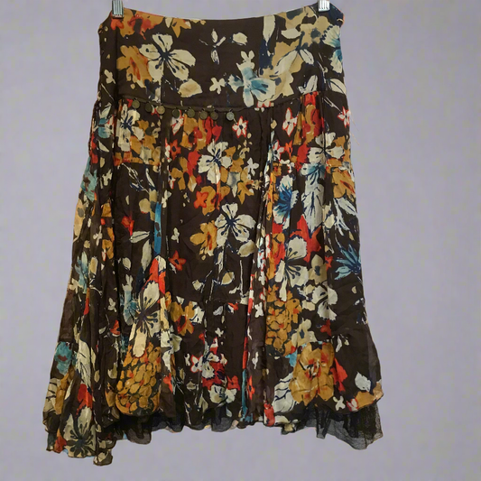 collecting wild flowers brown skirt