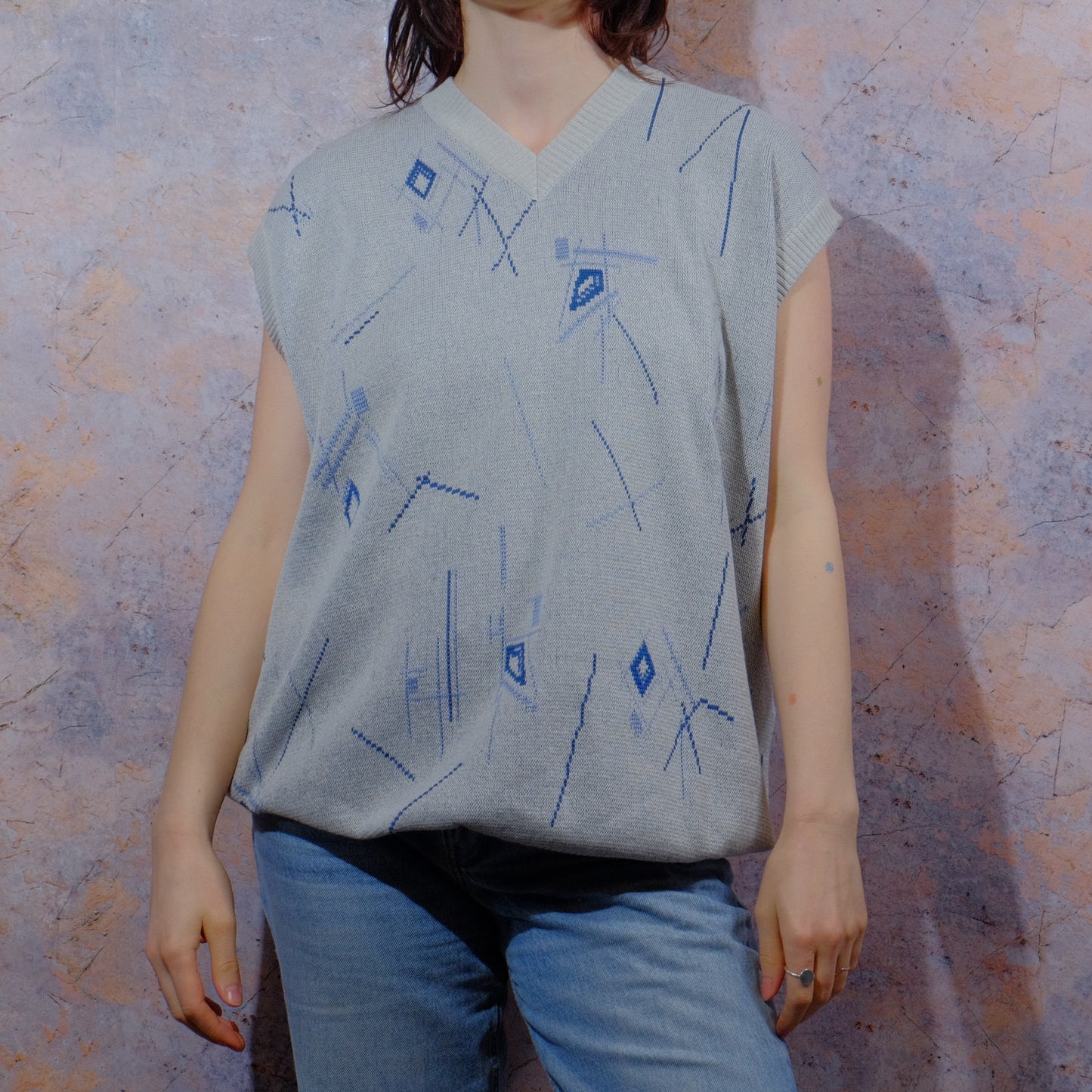 calm sea and distant chattering knitted vest