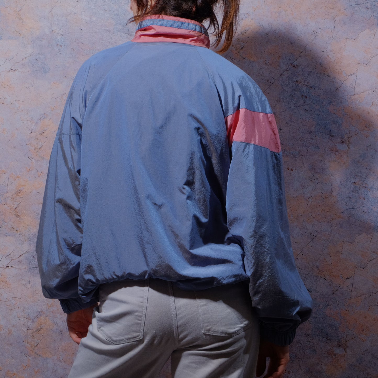 modernized marble statue gray jacket