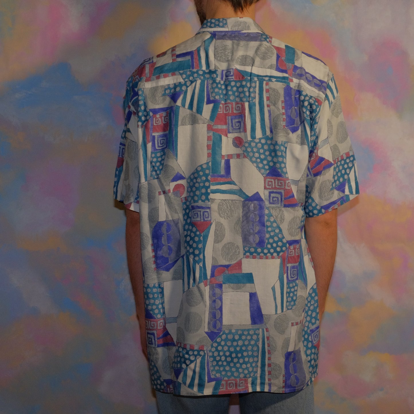living sculpture blue shirt