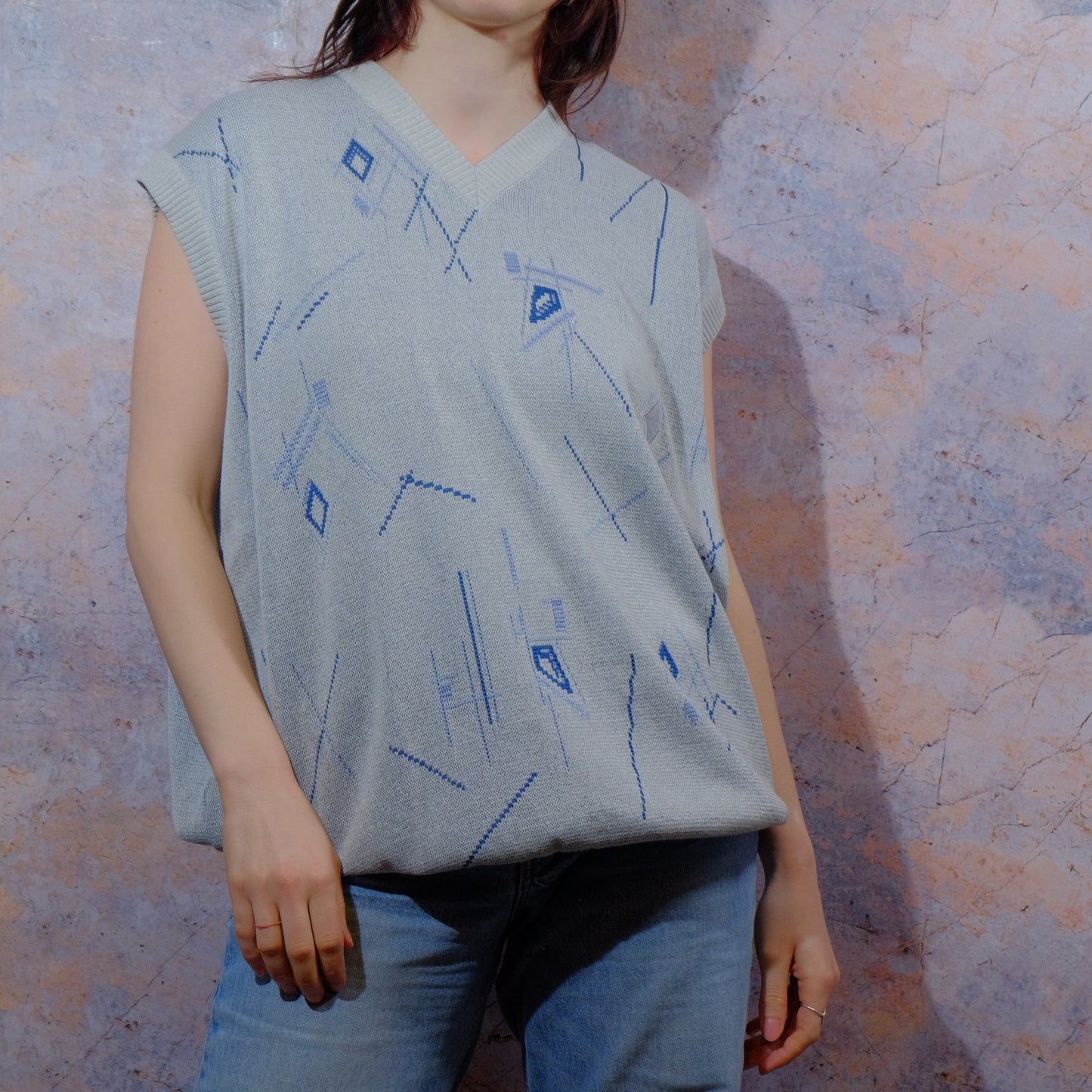 calm sea and distant chattering knitted vest