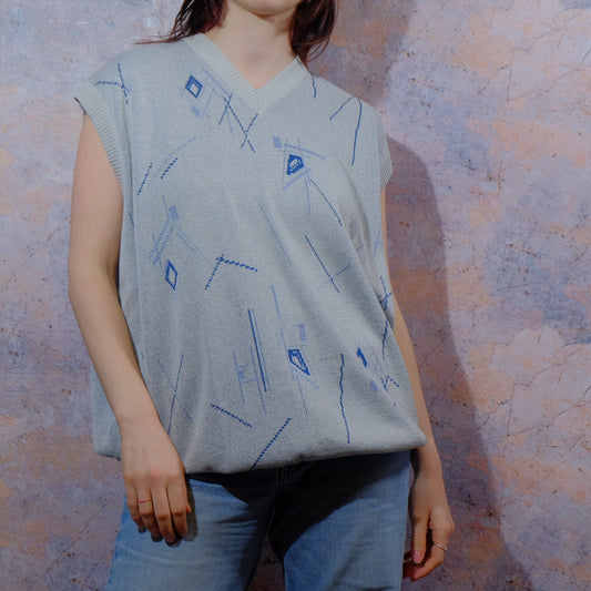 calm sea and distant chattering knitted vest